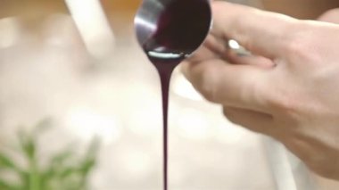 Pour All Syrup From Jigger To Glass - Close Up