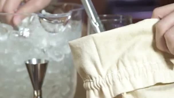 Put Ice Cloth Bag Close — стоковое видео