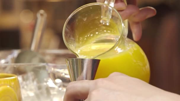 Pouring Yellow Juice Iron Shaker Jigger Close — Wideo stockowe