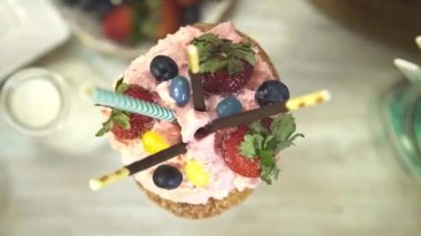 Cream with lots of sweet garnish - Pull Focus