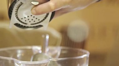 Drain Water From Shaker - Close Up