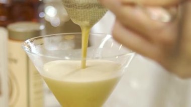 Filter White Drinks From Shakers - Close Up