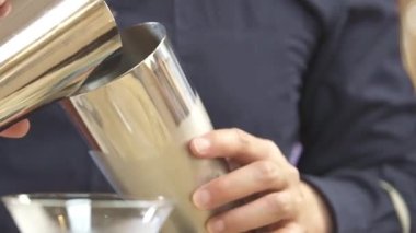 Pour Black Water Into The Shaker Then Close It Firmly - Close Up