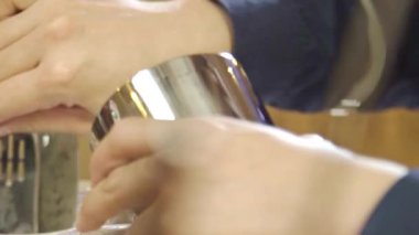 Put Ice On The Iron Shaker - Close Up