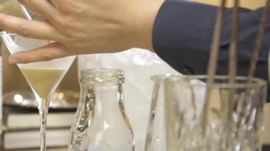 Pouring White Liquid Into Glass - Close Up