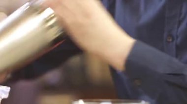 Shuffle Shaker With Both Hands - Close Up.