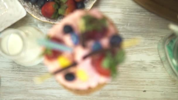 Cream Pink Fruit Garnish Candy Pull Focus — стоковое видео