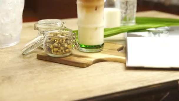 Iced Latte Colors Pandan Garnish Tilt — Stockvideo