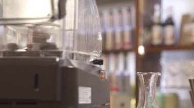 a glass drink with flowers on top - slide right.