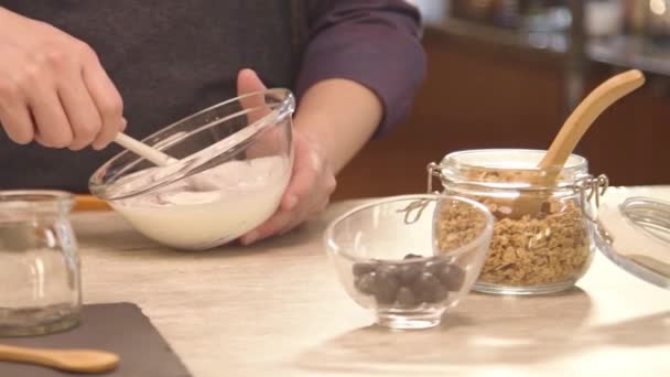 Hand Mixing Yogurt Glass Bowl Slide Right — Αρχείο Βίντεο