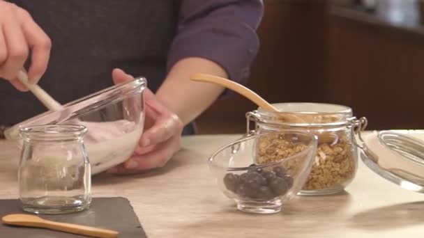 Man Mixing Yogurt Table Garnish Slide Left — Vídeos de Stock