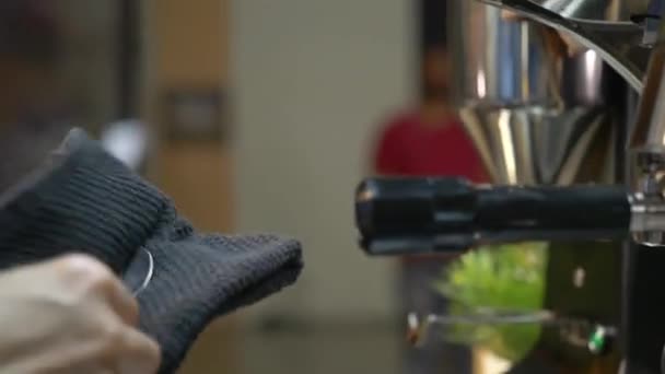 Man Wiping Coffee Machine Cloth Rack Focus — Vídeo de stock