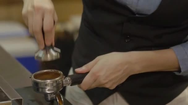 Woman Compressing Coffee Powder Lever — Stock Video