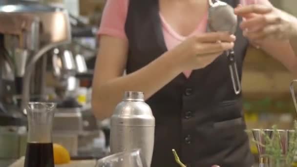Woman Pouring Juice Out Shaker Sieve — Stock Video
