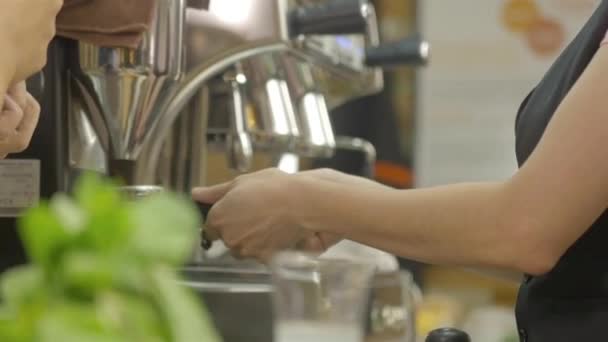 Woman Using Coffee Machine Grabbing Lever Static — стоковое видео