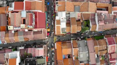 Aerial Shot Of Busy WalK Way Street In Small Town Melaka - Dolly Forward