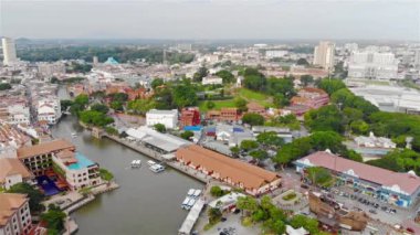Clear Blue Skies Of Melaka Skyline With White Buildings - Pan Right To Left.