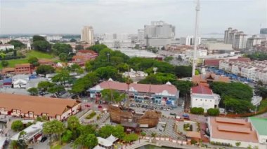 Mid Day Clear Skies Looking Over Melaka - Aerial Shot Pan Right To Left.