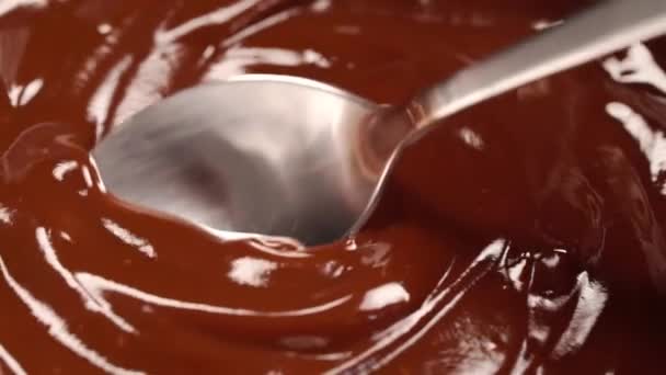Chocolate Icing Scooped Metal Silver Spoon Bowl Extreme Close Shot — Stock Video