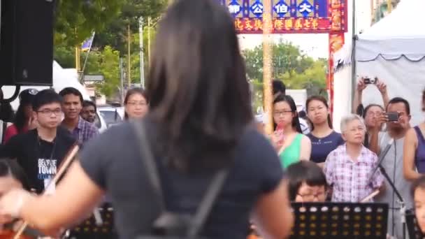 Back Female Orchestra Dirijor Penang — Videoclip de stoc