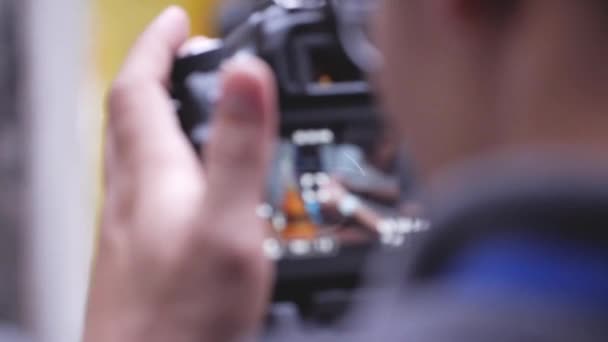 Cameraman Filming Woman Using Kerosene Lamp — стокове відео