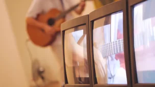 Vintage Computer Screens Showing Man Playing Guitar — Stock Video