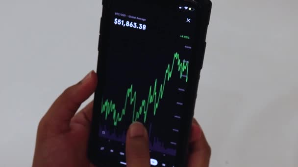Woman Looking Btc Chart Black Smartphone — Vídeo de Stock