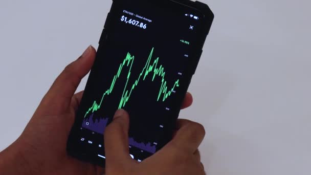 Woman Looking Eth Month Chart Black Smartphone — Αρχείο Βίντεο