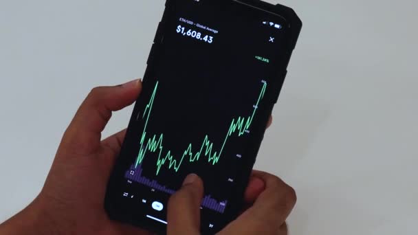 Woman Looking Etherium Charts Cellphone — Stock Video