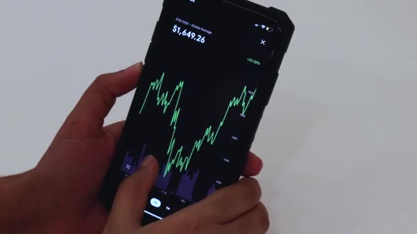 Woman Looking Eth Days Chart Black Smartphone — Stockvideo