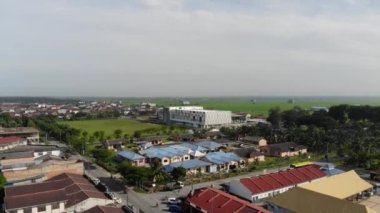 Aerial View Of Sekinchan Town In Malaysia - Crane Down