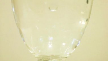 Color Dye Being Added Into Wine Glass - Maroon