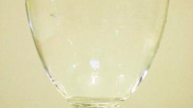 Color Dye Being Added Into Wine Glass - Peach