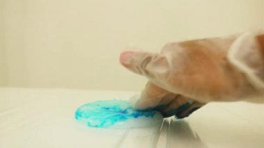 Color Dye Mixed White Slime Up-close - Blue