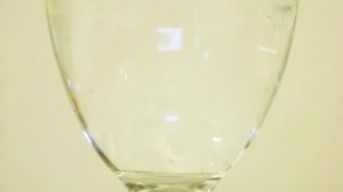 Color Dyes Being Added Into Wine Glass - Pink And Green