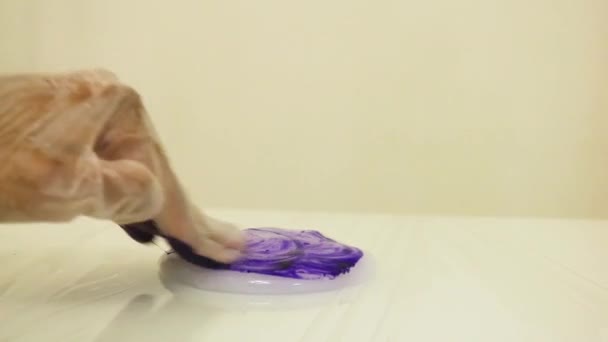 Color Dye Mixed White Slime Close Violet — Video Stock