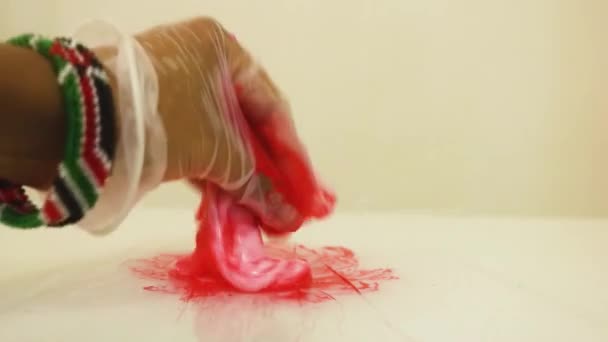 Color Dye Mixed White Slime Close Red — Vídeos de Stock