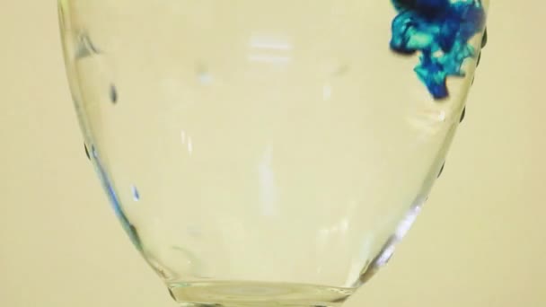 Color Dyes Being Added Wine Glass Blue Black — Vídeo de Stock