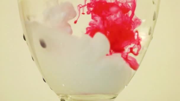 Color Dyes Being Added Wine Glass Pink White — Stock video