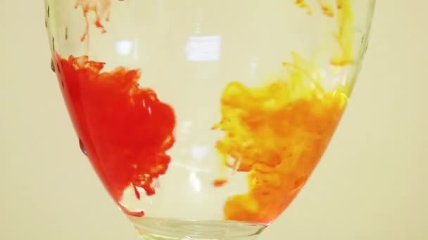 Color Dyes Being Added Wine Glass Yellow Peach — Stock video