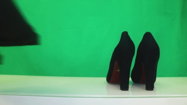 ブーツの横に配置されたヒール — ストック動画