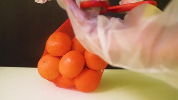 パケットから果物が削除される タンジェリン — ストック動画