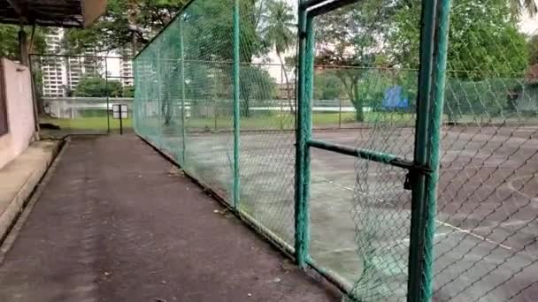 Old Basketball Court Being Entered Person — Stock Video