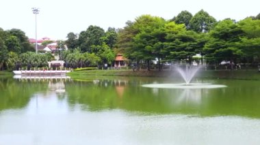Park Area With A Large Lake And A Fountain