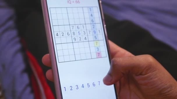 Playing Mobile Games Phone Sudoku — Stock Video