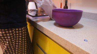 Ethnic Woman Removing Dragon Fruit From Plastic Bag