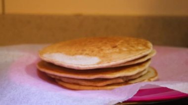 Pancakes Getting Stacked Up On A Plate