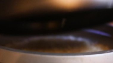 Rice Cooker Being Opened By Ethnic Woman