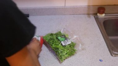 Vegetables Being Opened By An Ethnic Woman