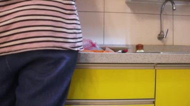 Vegetables Getting Peeled By Ethnic Woman 